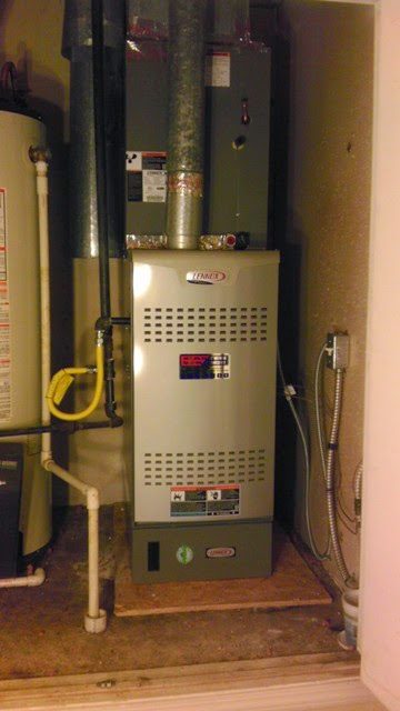 Lennox high-efficiency furnace installed in a utility closet