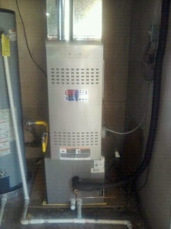 High-efficiency furnace installed in a Tulsa garage